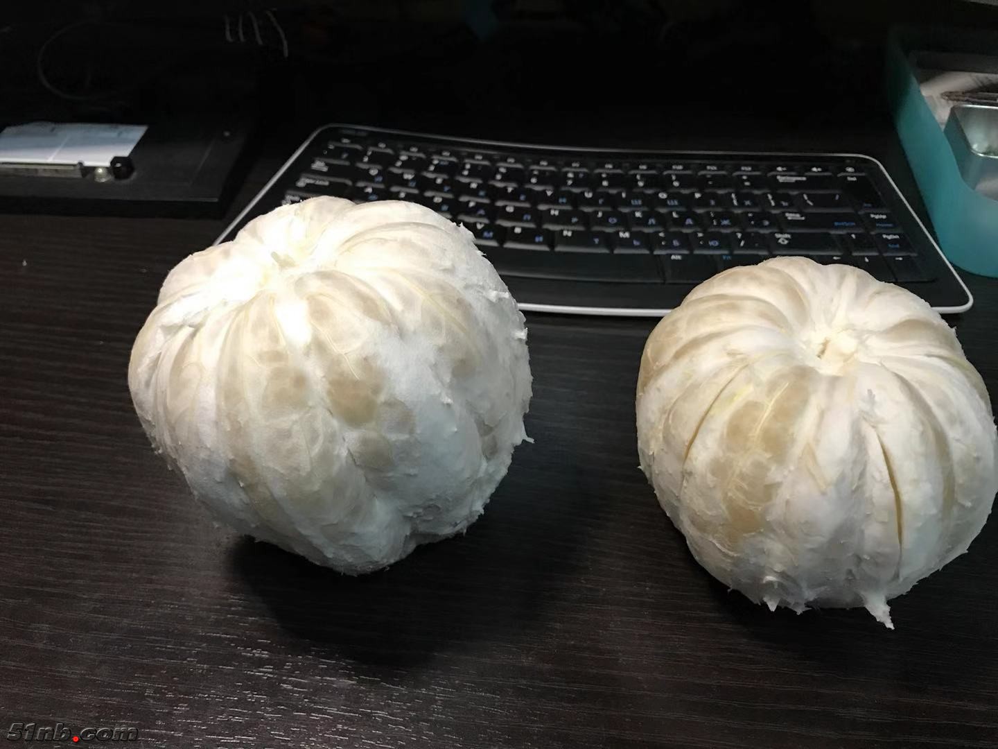 左边单果2.1斤，右边单果1.6斤